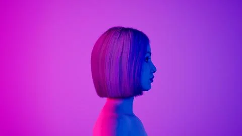 Female hyper-realistic robot or cyborg turn around in studio with neon light Stock Illustration