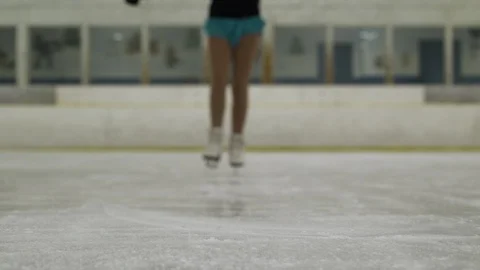 Female ice skating towards camera with close up of boots. 動画素材 88160366
