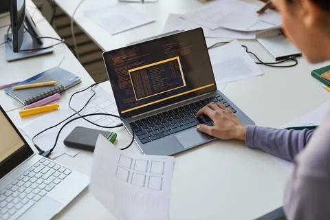 Female IT Developer Writing Code Stockfoto's