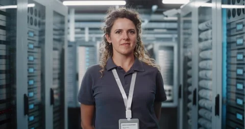 Female IT Specialist Standing in Data Center Server Room Stock Footage 344879564