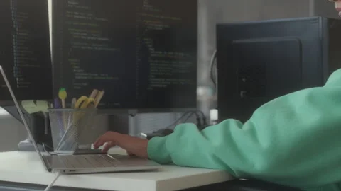 Female IT Specialist Typing Programming Code on Computer Stock Footage 263733883