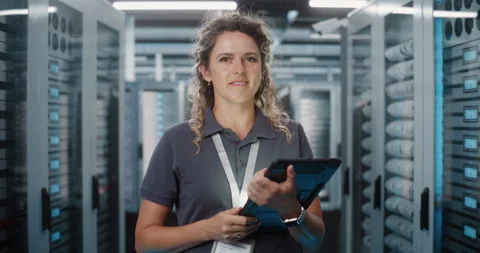 Female IT Specialist Using Digital Tablet for Data Center Audit Stock Footage 344880931