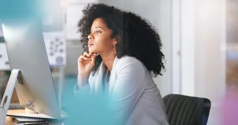 Female IT working on a desktop computer. Happy Information Technology operation Stock Photos