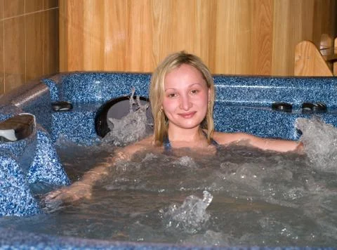 Female in the jacuzzi. Stock Photos
