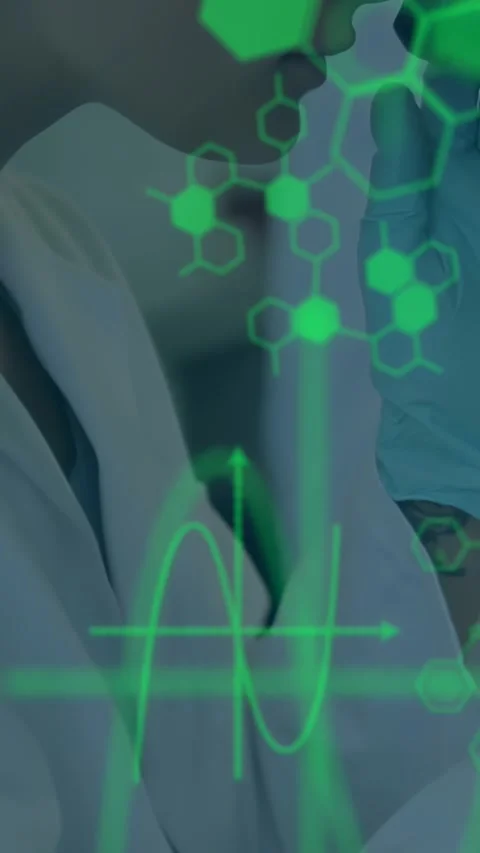 Female lab scientist leaning into microscope while green molecular icons 動画素材 332598405