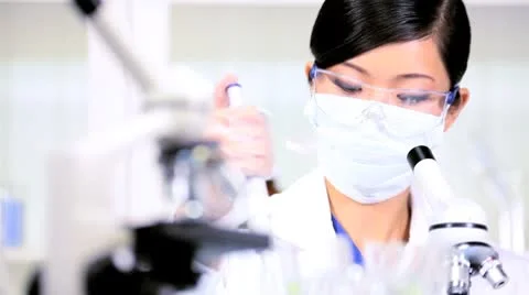 Female Lab Technician Doing  Research Experiments Stock Footage 8961825