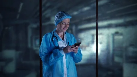 Female laboratory worker using smartphone. High Technology, Digital, Modern Stock Footage 95319469