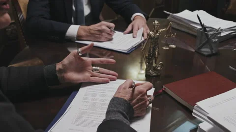 Female Lawyer Taking Notes during Meeting with Colleagues Stock Footage 170757007