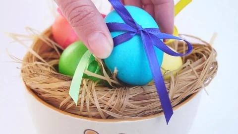 The Female Lays the Egg in a Bowl, Easter Stock Footage 73604182