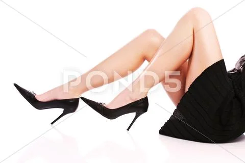 Female legs and high heels Stock Photos
