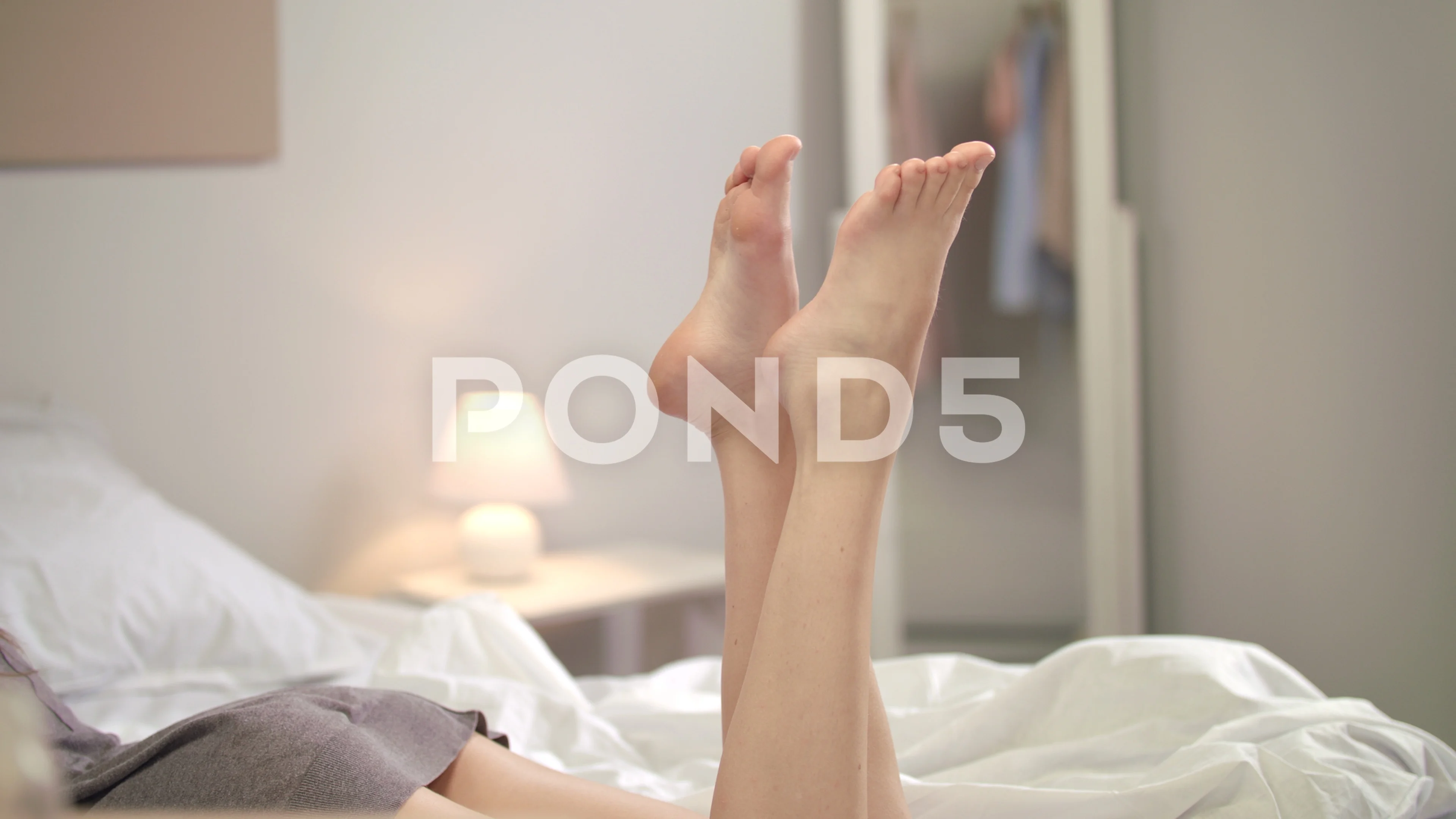 Female legs in bedroom. Close up of woma, Stock Video