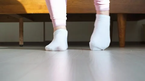 Female legs doing exercises and stretching feet front view. Stock Footage 293288694