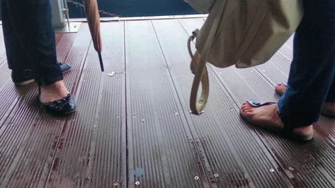 Female legs during a conversation on a rainy day. Stock Footage 123788700