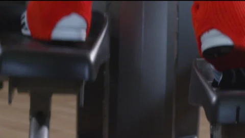 Female legs working out on exercise machines in the gym close-up Stock Footage 231746053