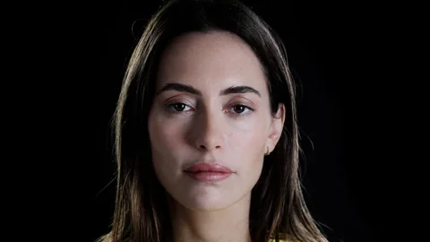 Female looking at camera for security scan Stock Footage 322059231