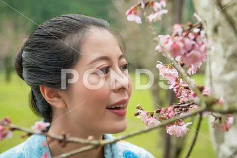 Female looking carefully to observe the detail Stock Photos