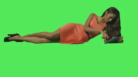 Female looking at digital tablet 動画素材 30520784