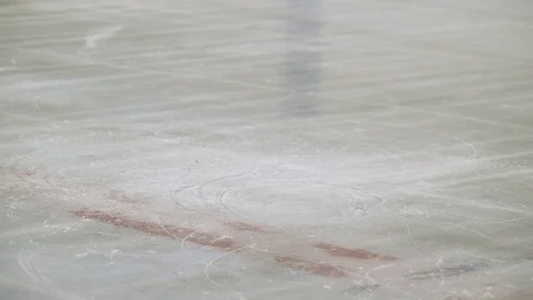 Female, low section spinning round on ice skates on ice rink. Stock-Footage 88160357