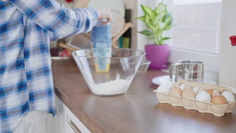 Female making dough for baking Stock Footage 177966504