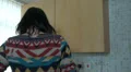 Female making tea in the kitchen at home HD Footage