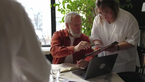 A female manager presents new project plan to boss explaining business strategy Video stock 166059628