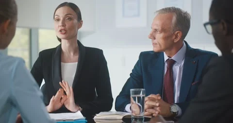 Female manager shaking hands with client at business meeting in office 動画素材 155850241