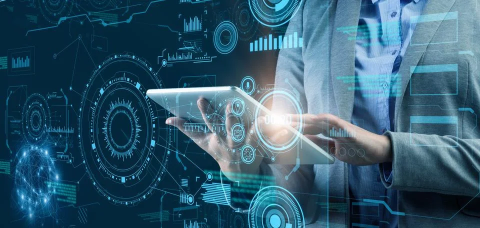 Female manager using digital tablet to analyze business and financial data Stock Photos
