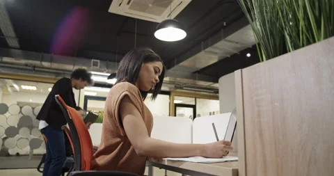 Female manager working in office Stock Footage 195218540