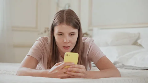 Female messaging use mobile in apartment Stock Footage 157161783