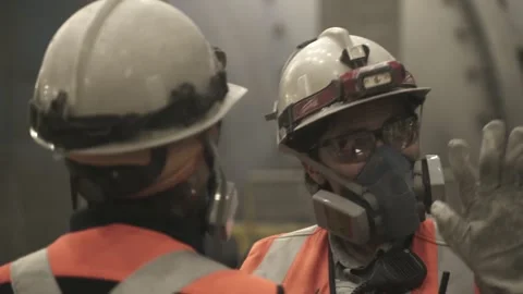 Female Mining Workers Communicating Inside El Teniente Processing Plant Stock Footage 339378263