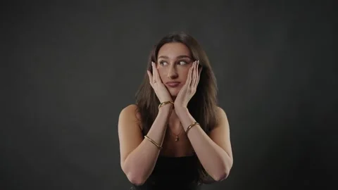 Female model clapping hands, celebration and applause concept, studio shot with Stock Footage 336938595