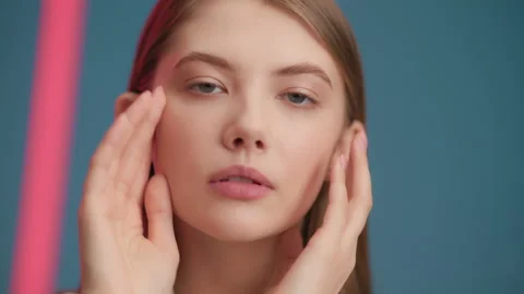 Female model emotionally posing and looking at camera. Portrait of young 20s wom Stock Footage 199483779