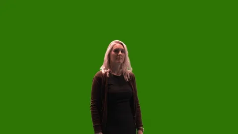 Female model on green screen pointing to... | Stock Video | Pond5