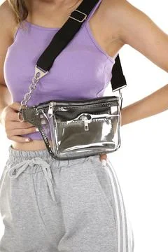 Female model holding a women's bag on white background Stock Photos
