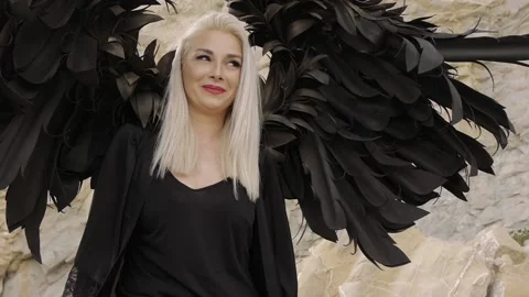 Female model in the image of an angel with wings Stock Footage 172586361