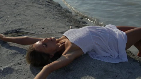 Female model posing on the beach Stock Footage 280843674