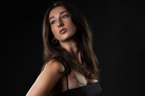 Female model posing with elegance and stylish jewelry Stock Photos
