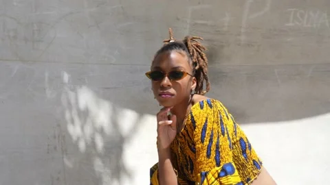 Female Model Posing Outside With Sculpture Stock Footage 196358545