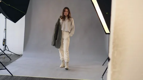 Female model posing at studio during photo shoot. Stock Footage 124911878