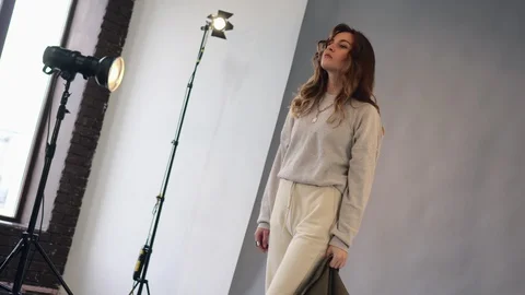 Female model posing at studio during photo shoot. Stock Footage 126038809