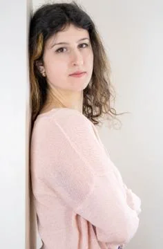Female model posing on wall Stock Photos