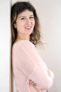 Female model posing on wall Stock Photos