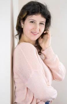 Female model posing on wall Stock Photos