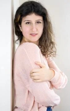 Female model posing on wall Stock Photos