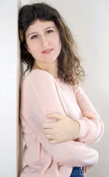 Female model posing on wall Stock Photos