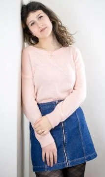 Female model posing on wall Stock Photos