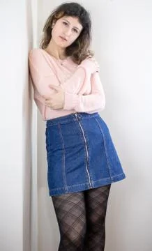 Female model posing on wall Stock Photos