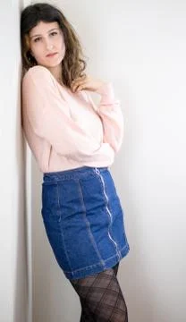 Female model posing on wall Stock Photos