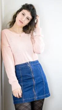 Female model posing on wall Stock Photos