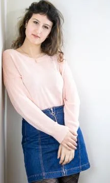 Female model posing on wall Stock Photos